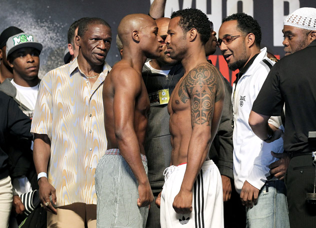 Floyd Mayweather Jr. and Shane Mosley face off before their night in the ring on May 1, 2010. Mayweather won by unanimous decision. Photo by Jed Jacobsohn/Getty Images.