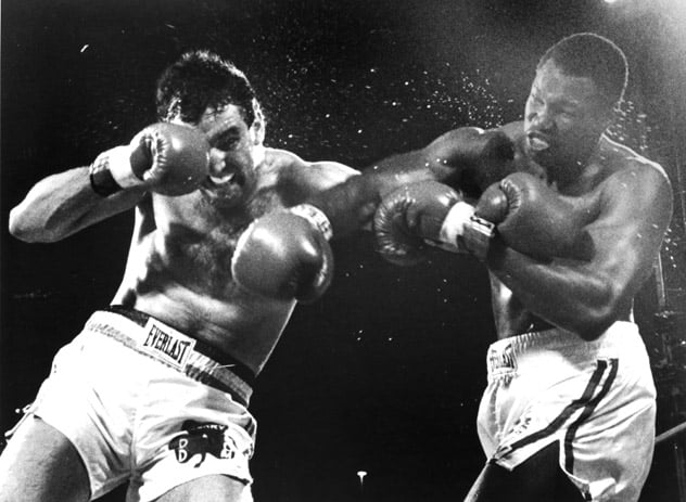 Larry Holmes (R) fighting Gerry Cooney in 1982. Photo: THE RING
