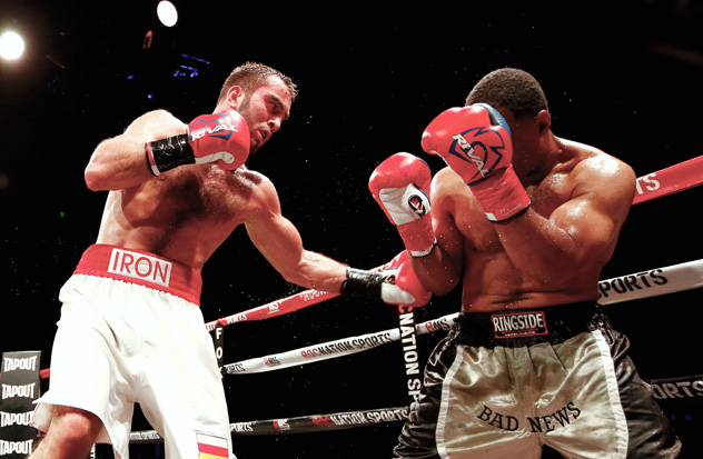 Murat Gassiev (L) digs a left at Felix Cora on April 17 in Mashantuckett, Conn. Photo by Rich Schultz/Getty Images.