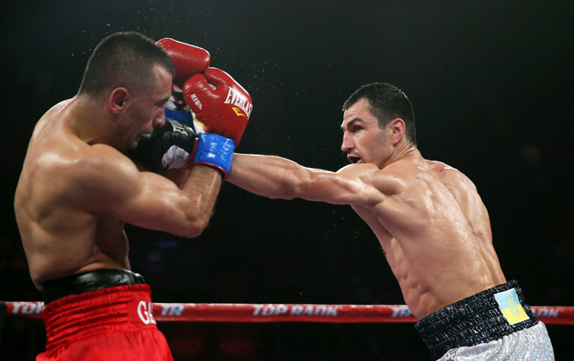 Viktor Postol (R) jabs Selcuk Aydin during their 140-pound clash at The Forum in Inglewood, Calif., on May 17, 2014. Photo by Jeff Gross/Getty Images.