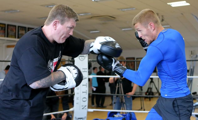 Terry Flanagan (R) works the mitts with former two-division titleholder Ricky Hatton. Photo by Dave Thompson/Getty Images.