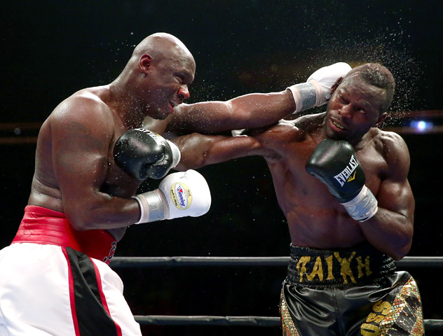 Antonio Tarver (L) lands a left on Steve Cunningham's head on Aug. 14, 2015, in Newark, N.J., but the fight would end in a draw. Photo by Elsa/Getty Images.
