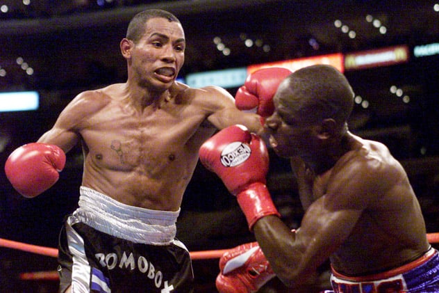 Ricardo Mayorga (L) fighting Andrew Lewis on July 28, 2001, in Los Angeles. The bout was stopped due to a headbutt and ruled a no-contest, but Mayorga won the rematch eight months later to gain his first world title. Photo by Jed Jacobsohn/Getty Images.