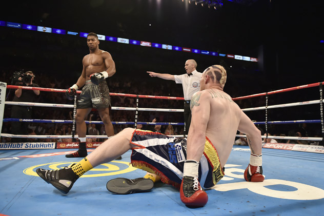 Anthony Joshua knocks down Gary Cornish last September. Photo by Leigh Dawney/Getty Images