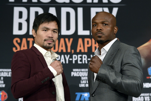Manny Pacquiao (L) and Timothy Bradley at the kickoff press conference for their third fight, which Pacquiao has said will be his last. Photo by Kevork Djansezian/Getty Images)
