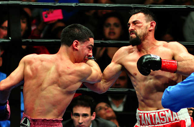 Robert Guerrero (right) was game and gritty to the bitter end in a losing effort against Danny Garcia in Los Angeles on Jan. 23, 2016. Photo by German Villasenor