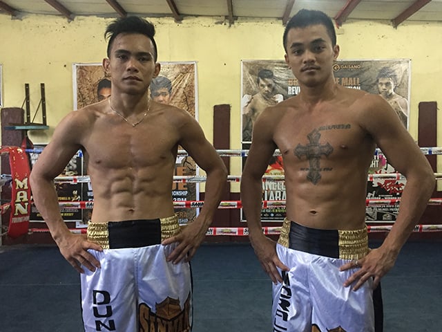 Junior lightweight Romero Duno (left) stands next to Sanman Gym stablemate and featherweight prospect John Vincent Moralde. Photo by Ryan Songalia