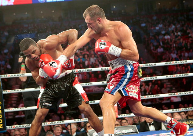 Sergey Kovalev (R) en route to an eighth-round stoppage of Jean Pascal last March. Photo by Herby Whyne.