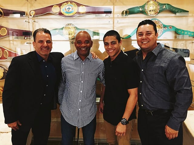 Left to right: Ken Sheer, of Sheer Sports Management, David Paul, David Mijares and Golden Boy VP Eric Gomez celebrate Mijares' signing with Golden Boy Promotions at the company's downtown L.A. office.