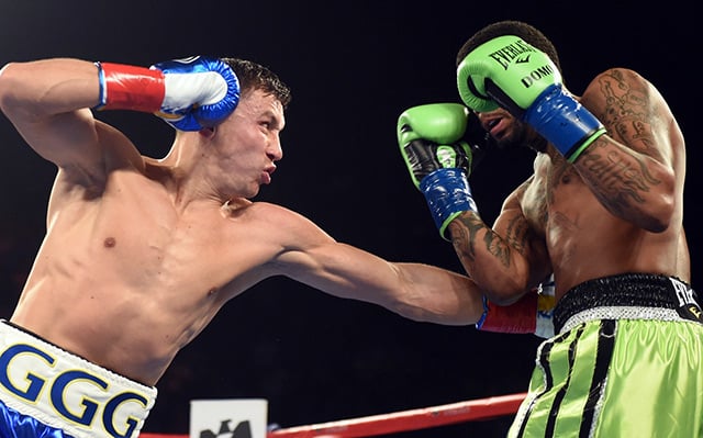 Gennady Golovkin (L) in his most recent fight, a second-round knockout of Dominic Wade. (Photo by Naoki Fukuda)