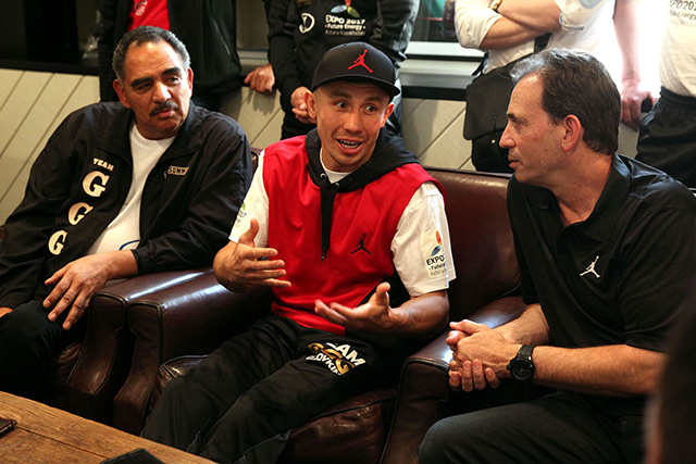 Left to right: Abel Sanchez, and animated Gennady Golovkin, and Tom Loeffler answer questions from the boxing media prior to a media workout for Golovkin's April 23 fight with Dominic Wade. Photo by Chris Farina / K2-GGG 2016