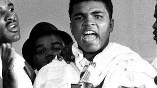 MIAMI BEACH - FEBRUARY 25,1964: Cassius Clay talks to the press after winning the fight against Sonny Liston at the Convention Hall on February 25, 1964 in Miami Beach, Florida. Cassius Clay won the World Heavyweight Title by a RTD 6. After this fight Cassius Clay changed his name to Cassius X and then to Muhammad Ali. 1964 Fight of the Year - Ring Magazine.(Photo by: The Ring Magazine/Getty Images)