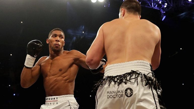 Anthony Joshua outpoints Joseph Parker to grab third heavyweight belt in dreary bout