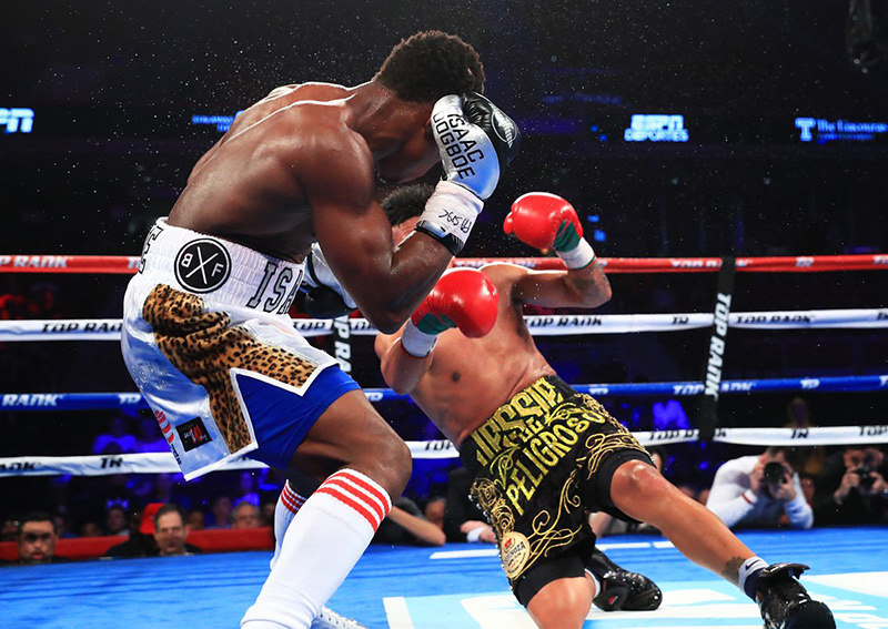 Isaac Dogboe scores one of three knockdowns en route to taking the WBO 122-pound title from Jesse Magdaleno. @TRboxing
