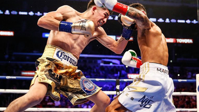 Leo Santa Cruz retains featherweight title with another win over Abner Mares in slugfest