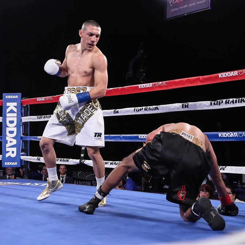 Lightweight Teofimo Lopez (standing) vs. Daniel Bastien. Photo credit: Mikey Williams/Top Rank