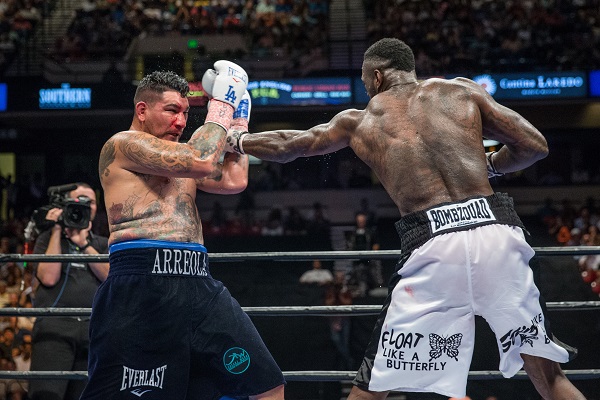 Deontay Wilder (right) vs. Chris Arreola. Photo credit: Ryan Hafey/Premier Boxing Champions