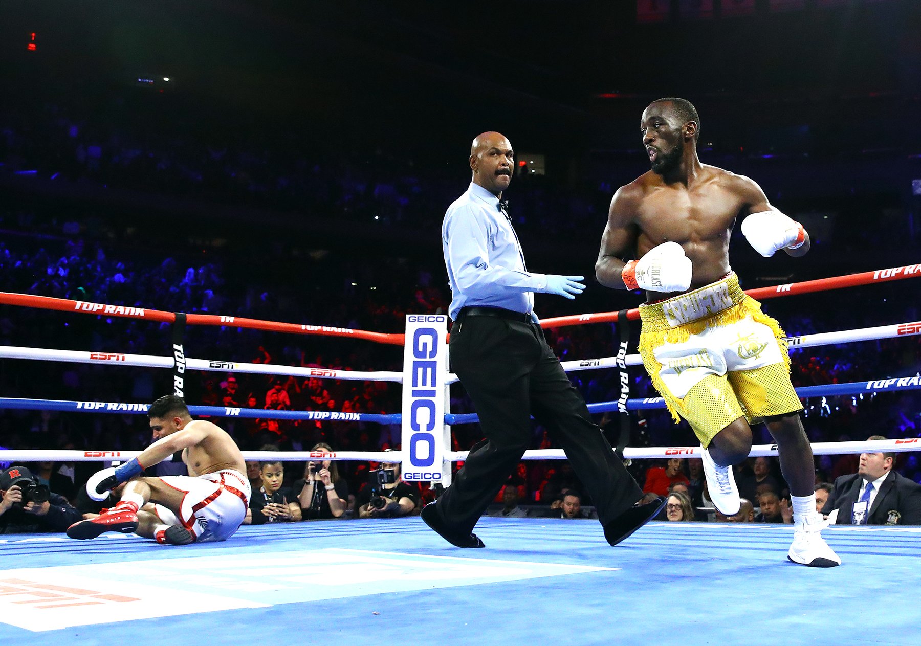 Terence Crawford punishes Amir Khan, but fight ends on disappointing low blow TKO
