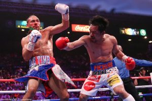 Manny Pacquiao (right) vs. Keith Thurman. Photo by Wendell Alinea/Team Pacquiao