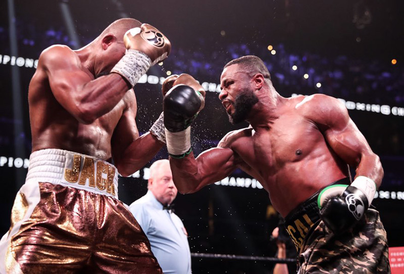 Jean Pascal (right) takes it to Badou Jack during the middle rounds of their closely contested light heavyweight bout. Photo courtesy of Showtime