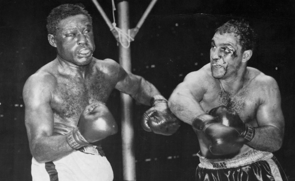 Charles went toe-to-toe with Rocky Marciano for 15 rounds in their brutal f...