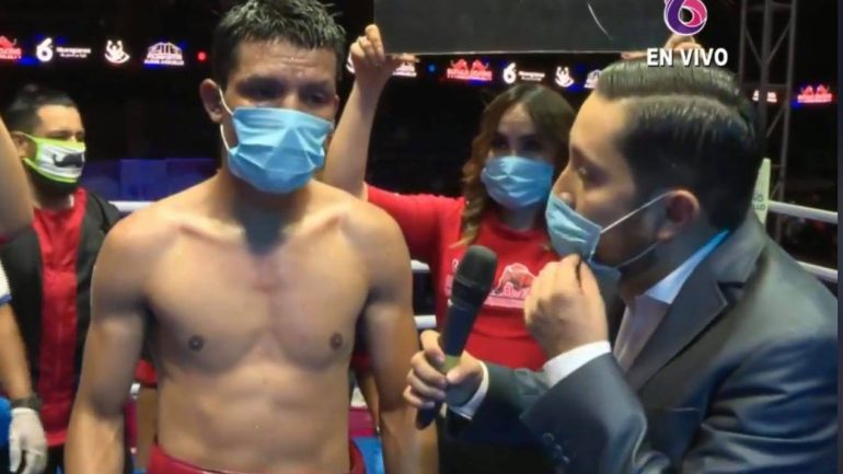 Face masks and empty seats: Pro boxing returns after month-long absence