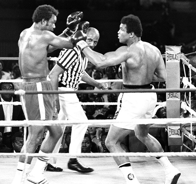 Muhammad Ali (right) on the attack against George Foreman. Photo by AFP/ Getty Images
