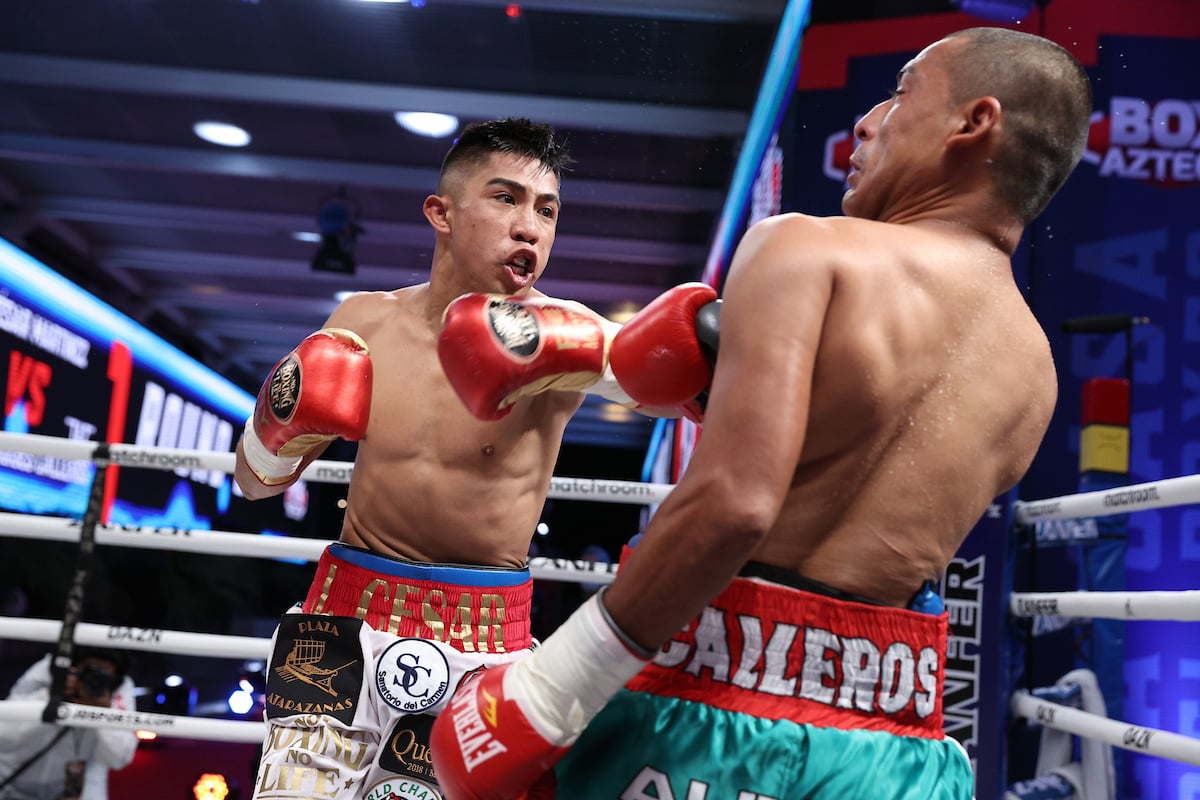 Julio Cesar Martinez (left) overwhelmed Moises Calleros. Photo by Ed Mulholland/Matchroom Boxing