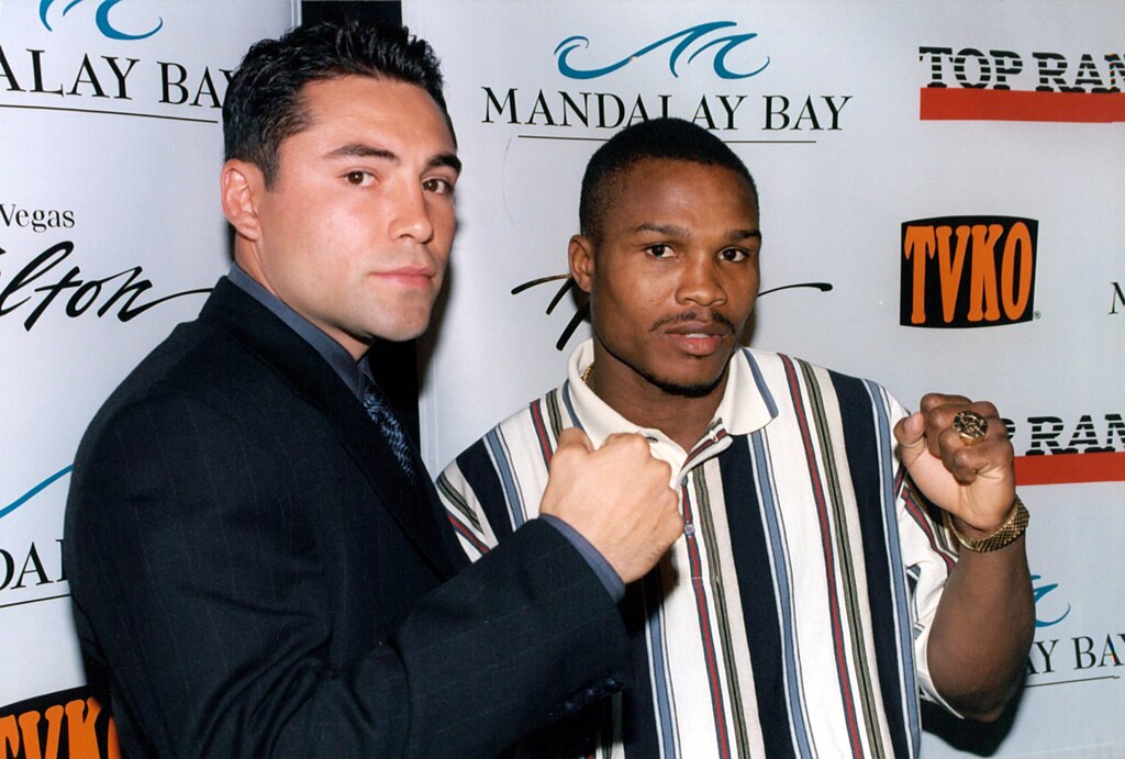 Oscar De La Hoya and Ike Quartey squared off in 1999. Photo from The Ring archive