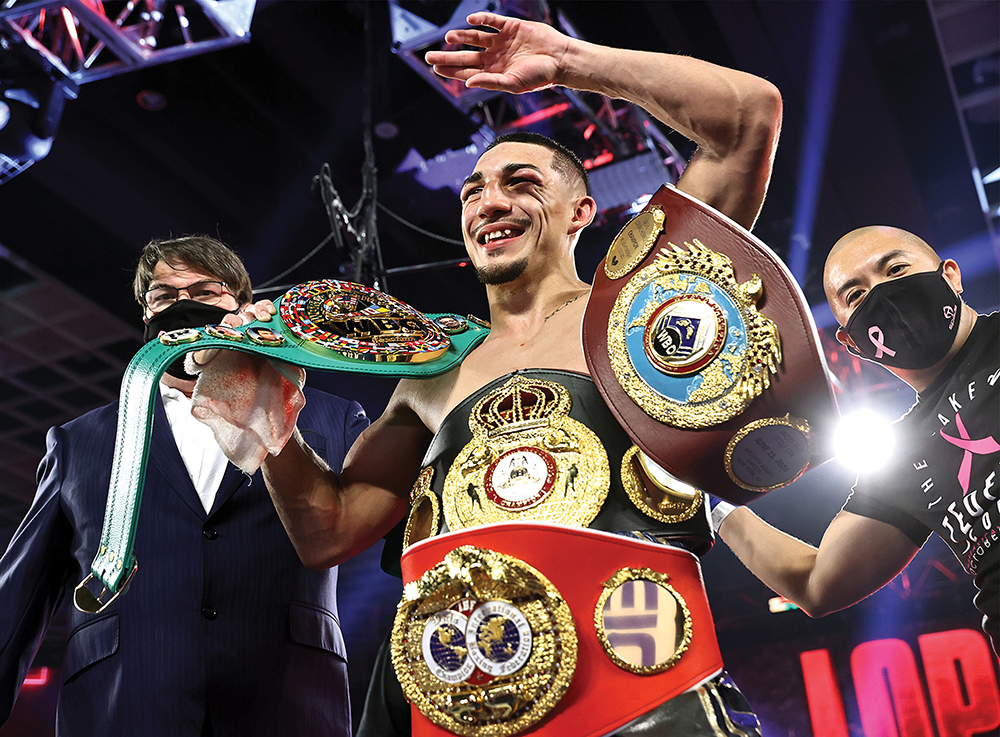 Teofimo Lopez Jr celebrates after defeating Vasiliy Lomachenko (not pictured) in their lightweight world title bout on October 17, 2020 in Las Vegas, Nevada. Photo by Mikey Williams/Top Rank via Getty Images