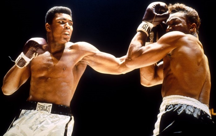 Muhammad Ali (left) vs. Cleveland Williams. Photo credit: Popperfoto