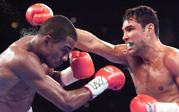 A victory over Oscar De La Hoya boosted Trinidad's status, but not without controversy