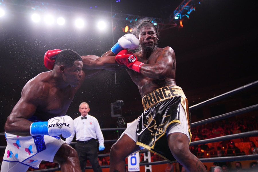 One monster overhand left from Luis "King Kong" Ortiz (left) turned around a difficult fight with Charles Martin and kept the veteran in The Ring's heavyweight rankings. Photo from PBC