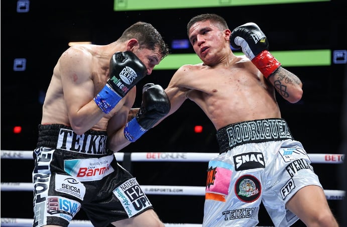 Jesse Rodriguez (right) grew up fast during his late-notice title shot vs. veteran Carlos Cuardras on February 5 at the Footprint Center in Phoenix, Arizona. Photo by Ed Mulholland/ Matchroom Boxing