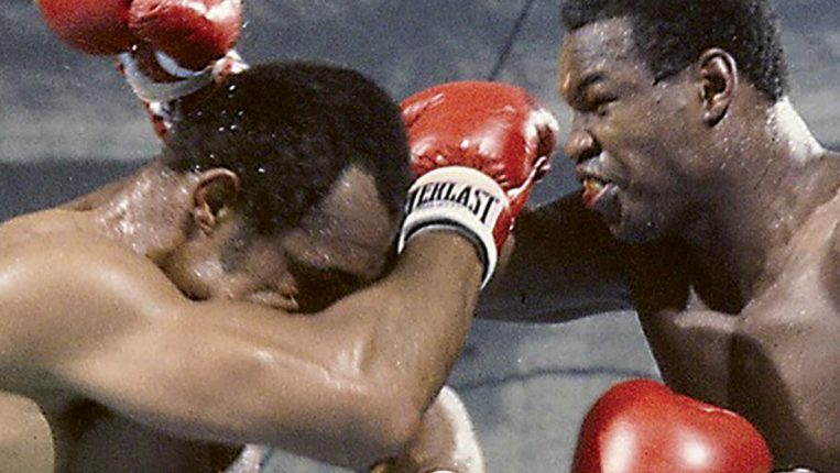 Holmes Outpoints Norton to Win WBC Heavy Title Flashback: The fight report from ringside