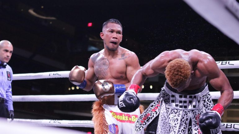 Eumir Marcial survives three knockdowns, scores controversial stoppage over Isiah Hart