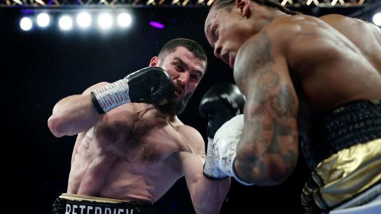 Artur Beterbiev retains light heavyweight crowns with exciting win over brave Anthony Yarde