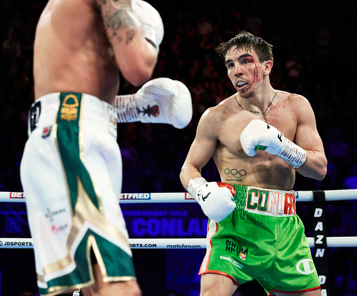 Leigh Wood vs. Michael Conlan (right). Photo by Mark Robinson/Matchroom Boxing