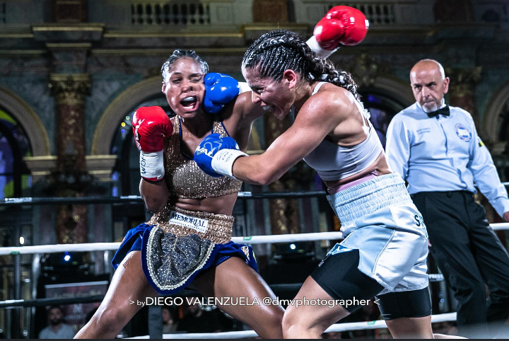 WBA women's junior bantamweight titlist Clara Lescurat (right) nails Daniela De Jesus Aguilar with a right hand during their bout in Paris, France, on May 17, 2023. Photo credit: Diego Valenzuela.