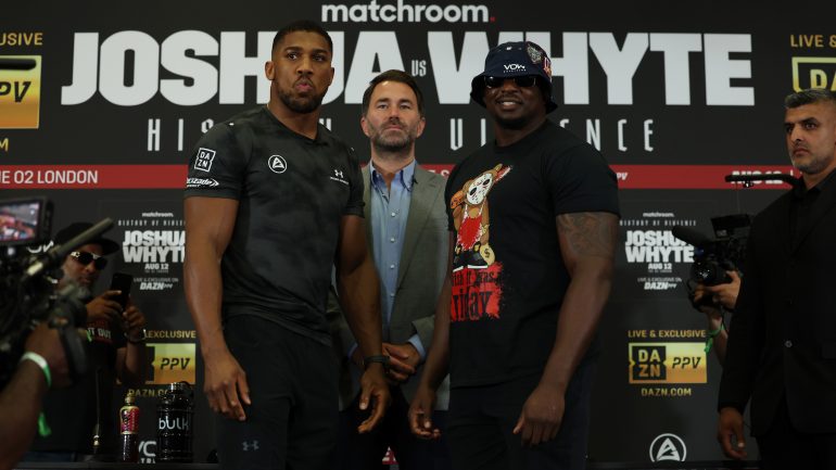 Anthony Joshua and Dillian Whyte trade barbs in first public meeting ahead of rematch